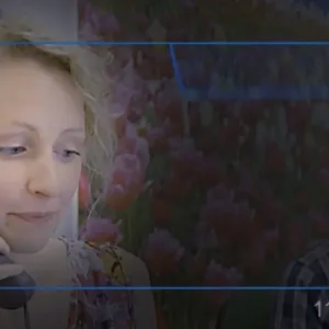Woman on a phone call with a futuristic scanning graphic overlay on screen