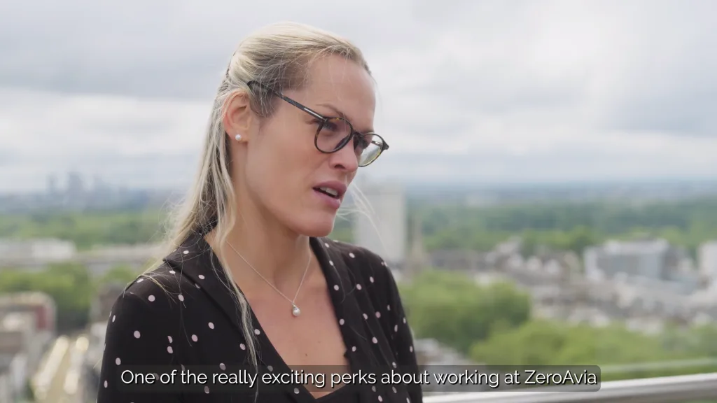 A ZeroAvia team member being interviewed on a rooftop with the London skyline in the background, filmed by Floating Harbour for an employee testimonial highlighting work at the company.