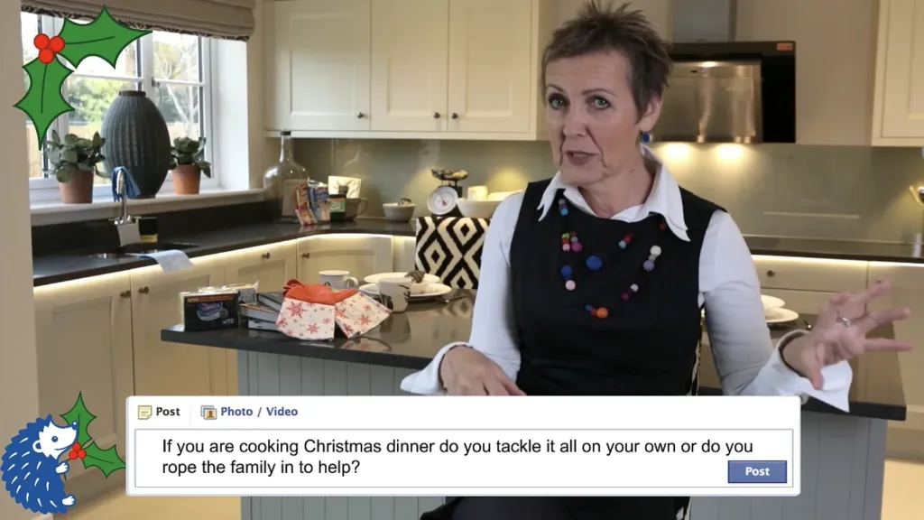 Aggie MacKenzie talks in a modern kitchen with festive graphics and a Spontex message onscreen