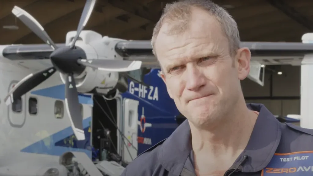 Test pilot interviewed beside a ZeroAvia aircraft fitted with a propeller.