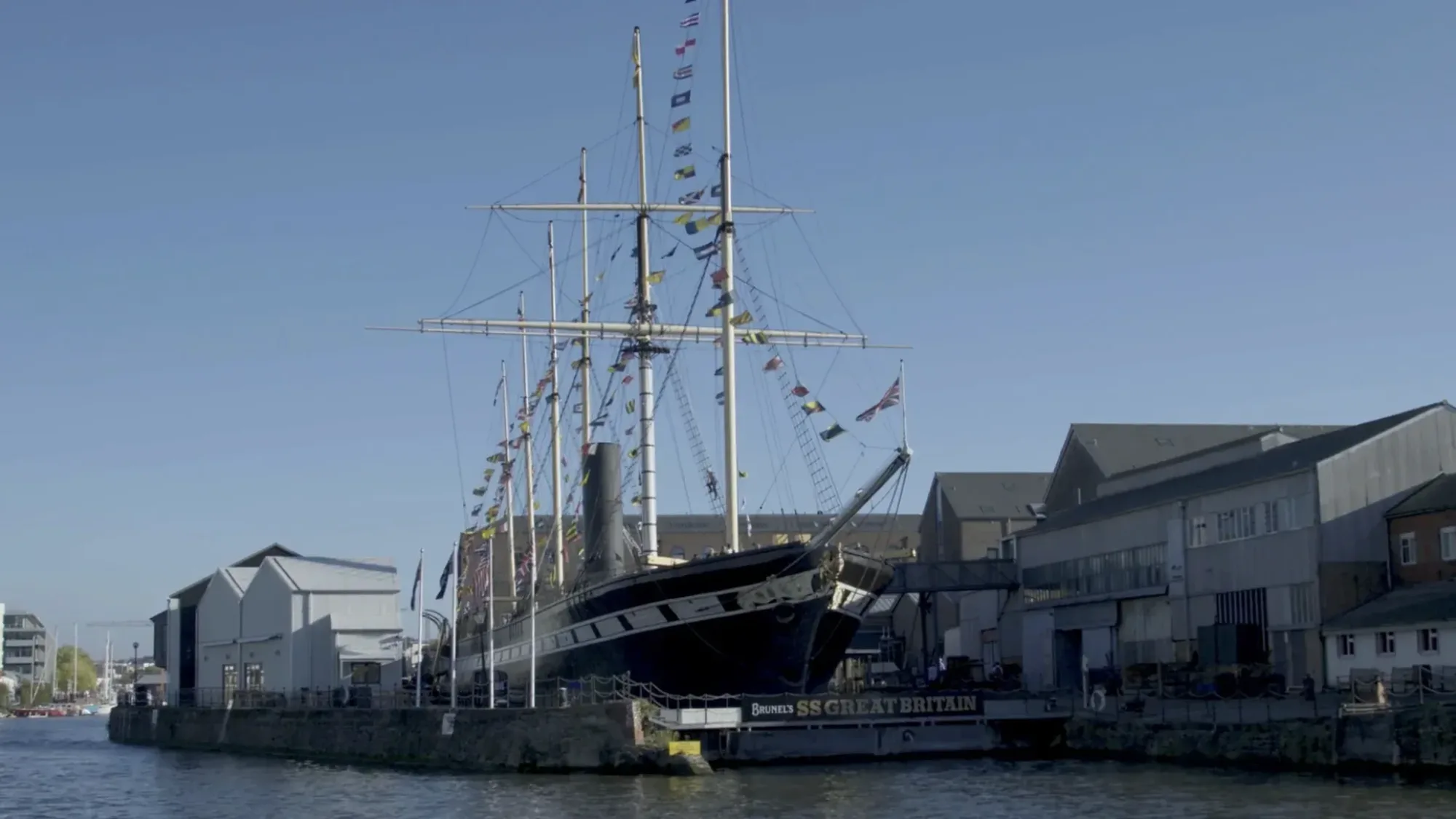 Brunel’s SS Great Britain moored in Bristol Harbour on a clear day.