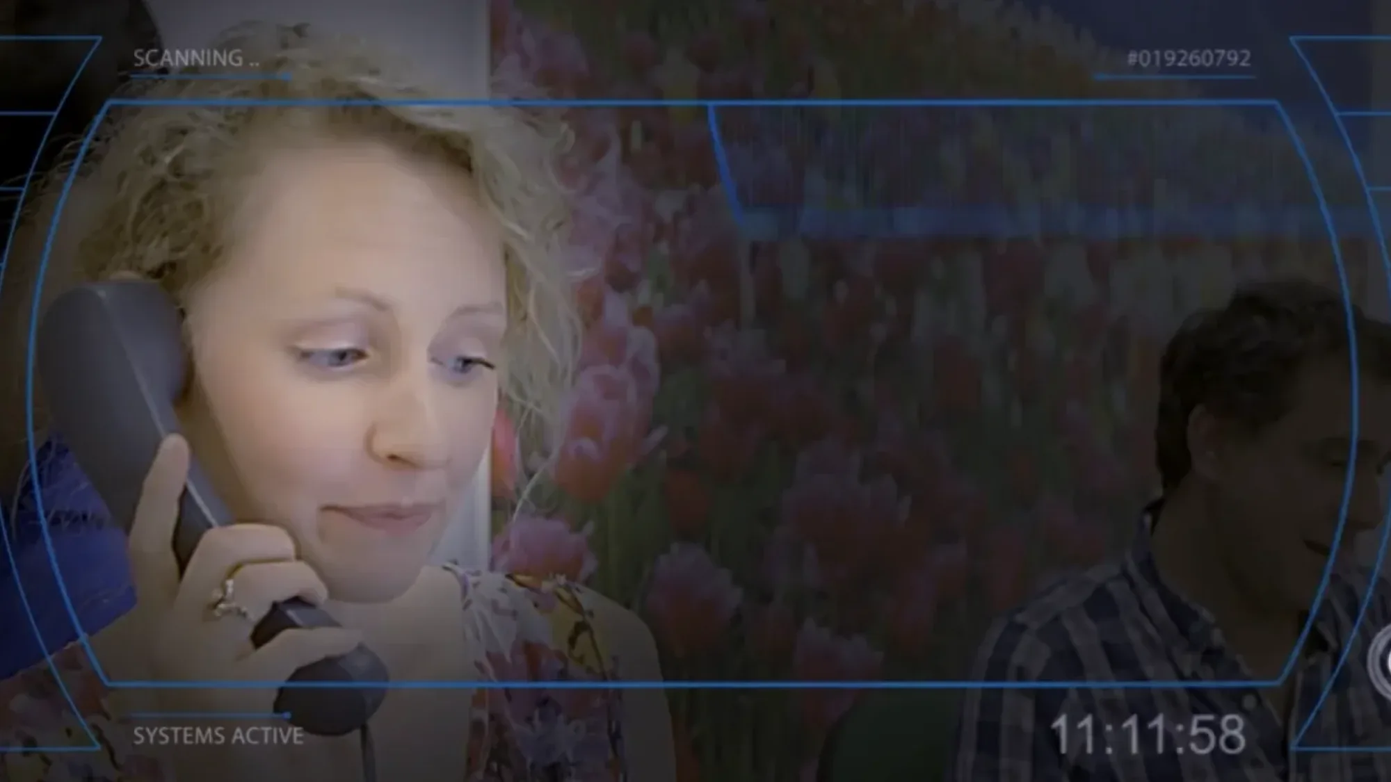 Woman on a phone call with a futuristic scanning graphic overlay on screen