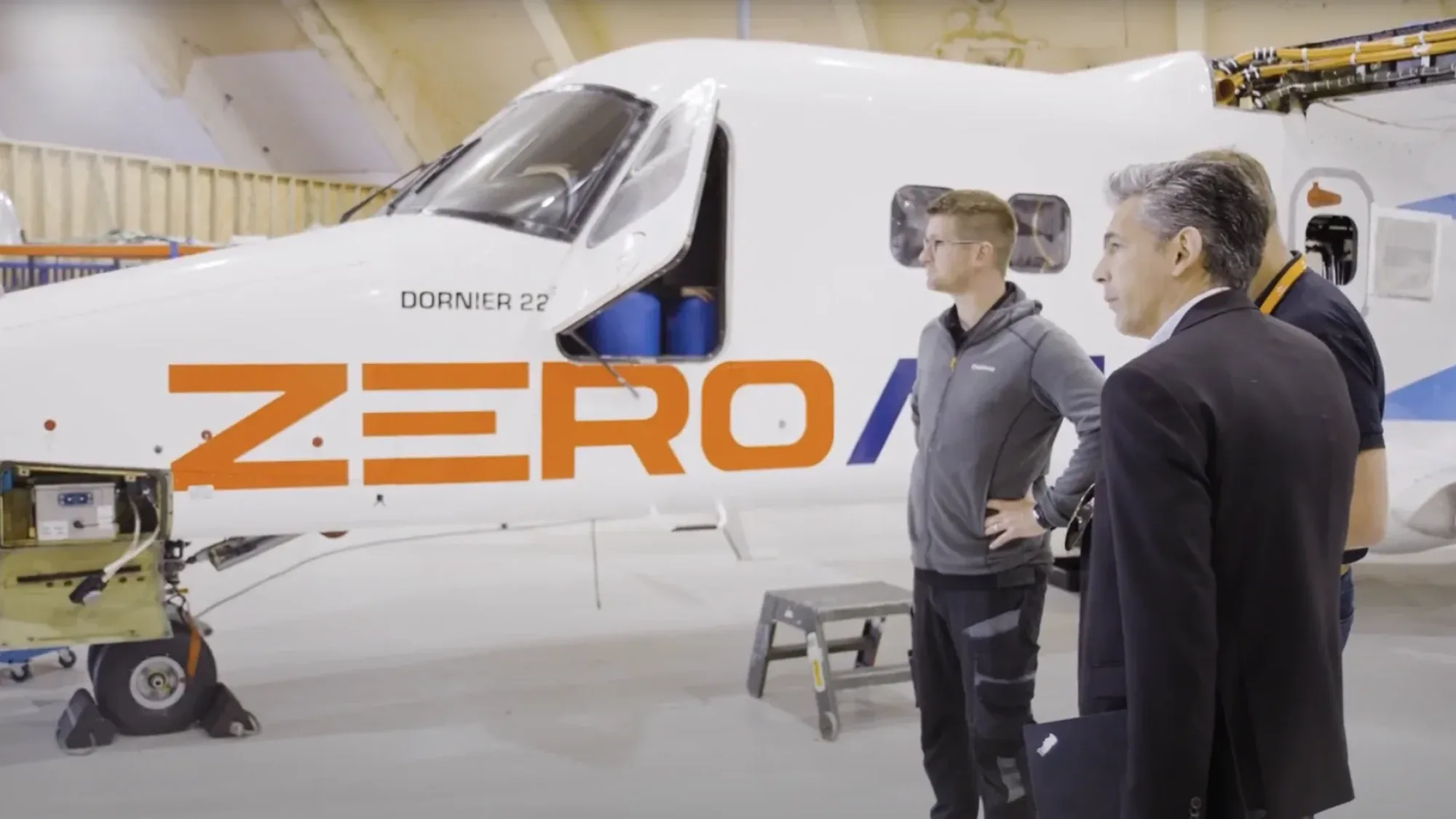 ZeroAvia engineers inspecting the Dornier 228 hydrogen-electric test aircraft in Bristol.