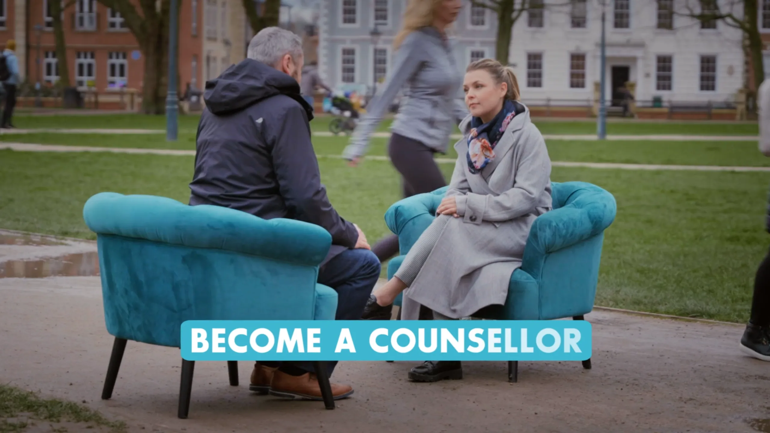 Two people sit in teal chairs during a Chrysalis branded social campaign film promoting career change and encouraging viewers to become a counsellor.