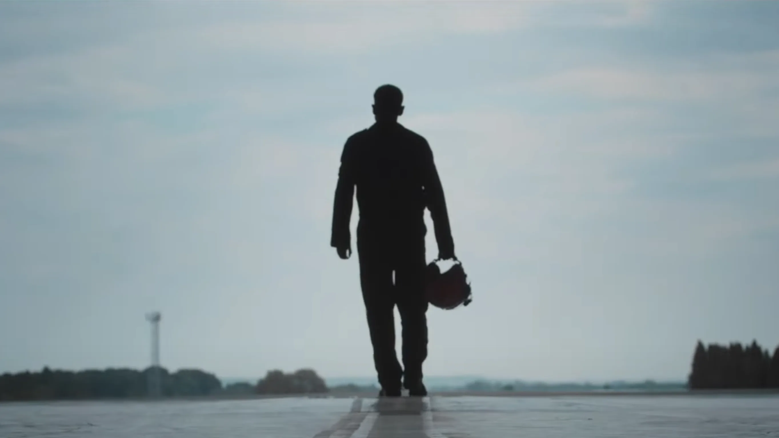 Emission Impossible documentary poster — a silhouetted figure against a dramatic sky, produced by Floating Harbour for Hot Docs festival